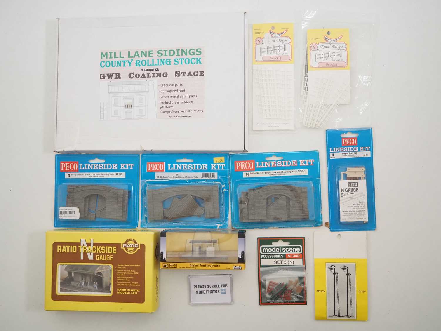 Lot 16 - A quantity of N gauge building kits by PECO,...