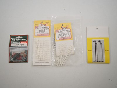 Lot 16 - A quantity of N gauge building kits by PECO,...