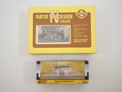 Lot 16 - A quantity of N gauge building kits by PECO,...