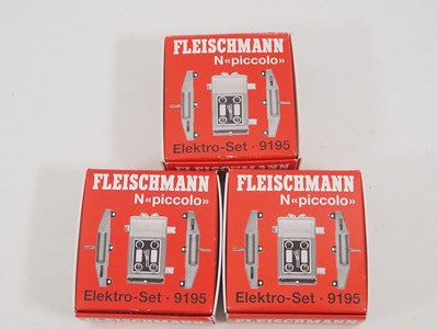 Lot 33 - A large group of FLEISCHMANN N gauge colour...