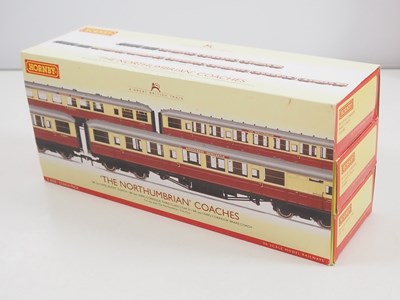 Lot 104 - A pair of HORNBY OO gauge triple coach packs...