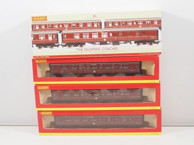 Lot 104 - A pair of HORNBY OO gauge triple coach packs...