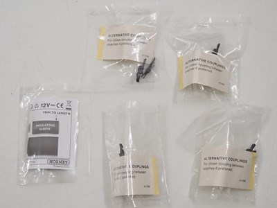 Lot 106 - A group of boxed and unboxed HORNBY OO gauge...