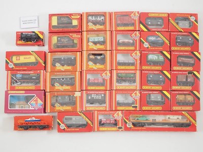 Lot 107 - A group of HORNBY OO gauge wagons, mostly...