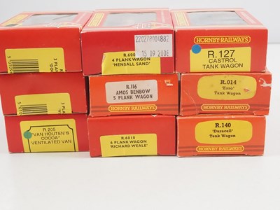 Lot 107 - A group of HORNBY OO gauge wagons, mostly...