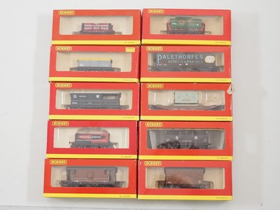 Lot 108 - A group of HORNBY OO gauge wagons mostly...