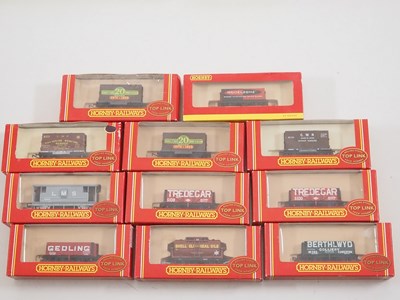 Lot 108 - A group of HORNBY OO gauge wagons mostly...