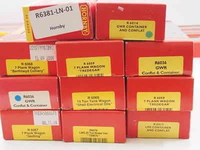 Lot 108 - A group of HORNBY OO gauge wagons mostly...