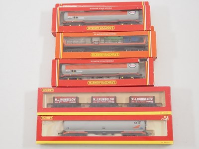 Lot 108 - A group of HORNBY OO gauge wagons mostly...