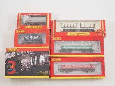 Lot 108 - A group of HORNBY OO gauge wagons mostly...