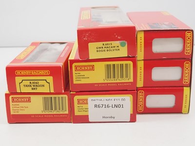 Lot 108 - A group of HORNBY OO gauge wagons mostly...