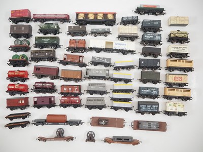 Lot 109 - A group of unboxed OO gauge wagons by HORNBY,...