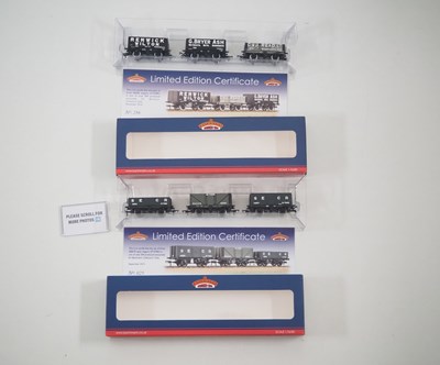 Lot 131 - A pair of BACHMANN OO gauge triple wagon packs,...