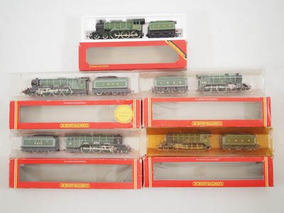 Lot 153 - A group of five HORNBY OO gauge steam tender...