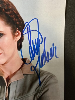 Lot 475 - STAR WARS - An 8" x 10" still of Princess Leia...