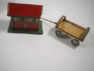 Lot 72 - A group of HORNBY O gauge tinplate buildings...
