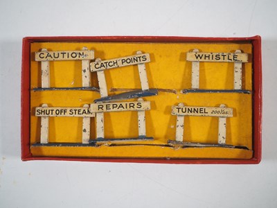 Lot 72 - A group of HORNBY O gauge tinplate buildings...
