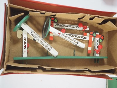 Lot 72 - A group of HORNBY O gauge tinplate buildings...