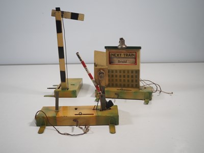Lot 72 - A group of HORNBY O gauge tinplate buildings...