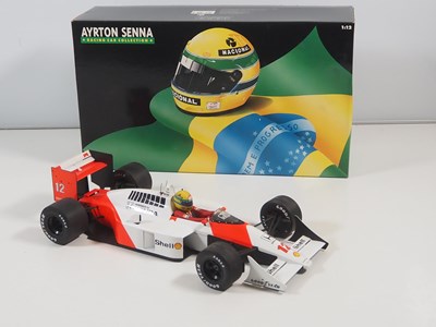 Lot 290 - A pair of MINICHAMPS 1:12 'Ayrton Senna Racing...