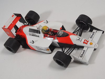 Lot 290 - A pair of MINICHAMPS 1:12 'Ayrton Senna Racing...