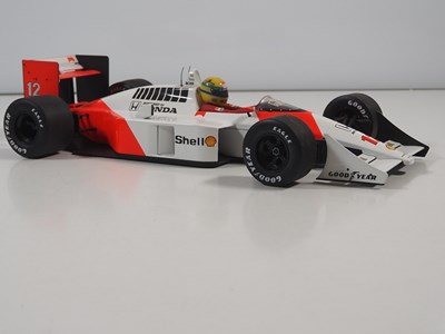Lot 290 - A pair of MINICHAMPS 1:12 'Ayrton Senna Racing...