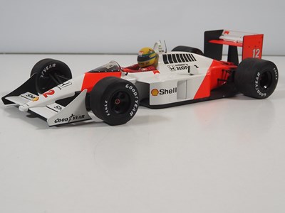 Lot 290 - A pair of MINICHAMPS 1:12 'Ayrton Senna Racing...