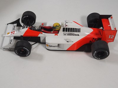Lot 290 - A pair of MINICHAMPS 1:12 'Ayrton Senna Racing...