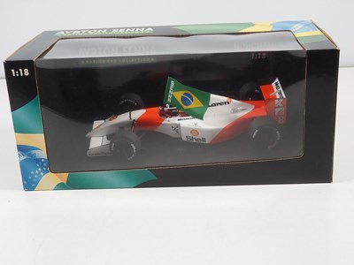 Lot 292 - A group of four MINICHAMPS 1:18 scale 'Ayrton...