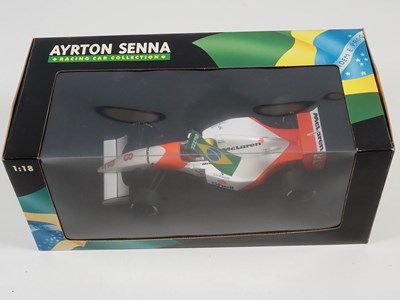 Lot 292 - A group of four MINICHAMPS 1:18 scale 'Ayrton...