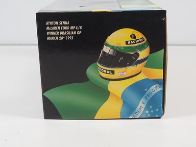 Lot 292 - A group of four MINICHAMPS 1:18 scale 'Ayrton...