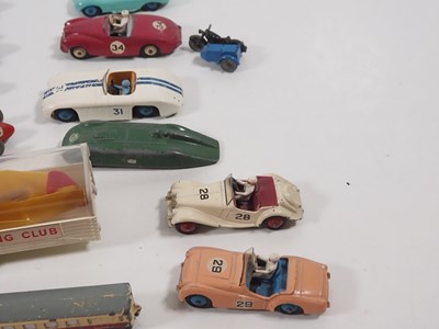 Lot 415 - A group of playworn diecast cars, buses etc by...