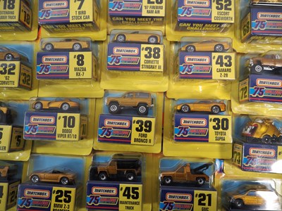Lot 48 - A group of MATCHBOX USA carded diecast gold...