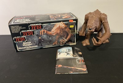Lot 724 - STAR WARS: A Rancor Monster figurine by...