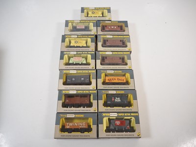 Lot 54 - A group of WRENN OO gauge wagons of various...
