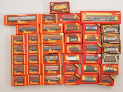 Lot 213 - A group of OO gauge wagons by HORNBY, WRENN...