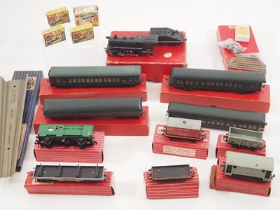 Lot 245 - A group of TRIX TWIN OO gauge rolling stock...