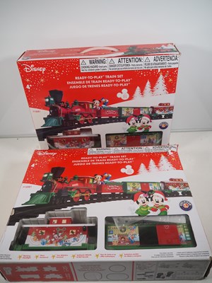 Lot 254 - A pair of LIONEL large scale plastic battery...