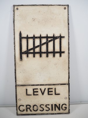 Lot 258 - A cast iron vintage road sign 'Level Crossing',...