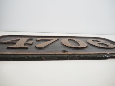 Lot 259 - A GWR cast iron cabside number 4706 from one...
