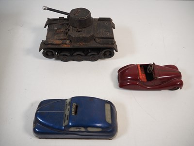 Lot 279 - A group of vintage tinplate toys comprising a...