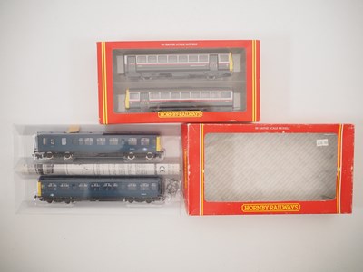 Lot 327 - A pair of HORNBY OO gauge 2-car DMUs...