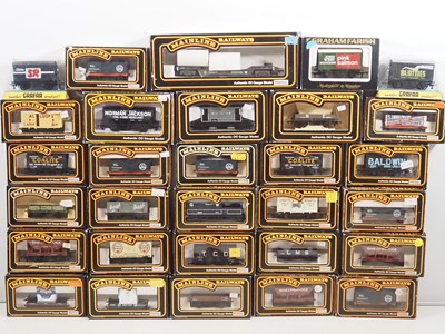 Lot 375 - A large quantity of OO gauge wagons by...