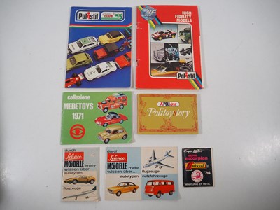 Lot 549 - A small group of international diecast toy...