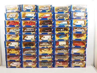 Lot 699 - CORGI - diecast cars and vans in blue window...