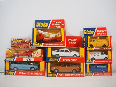 Lot 709 - A group of DINKY diecast cars in later...