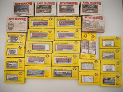 Lot 156 - A quantity of OO gauge plastic coach, building...