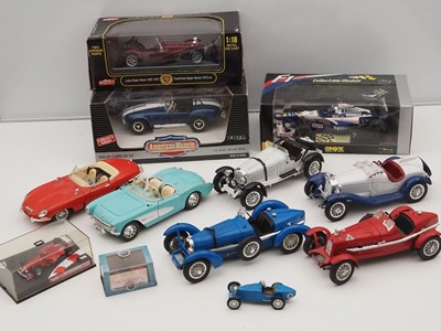 Lot 439 - A crate of boxed and unboxed mostly 1:18 scale...
