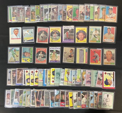 Lot 514 - BASEBALL - A collection of trading cards for a...