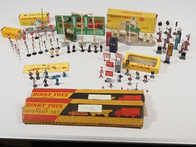 Lot 282 - A group of diecast and plastic DINKY figures...